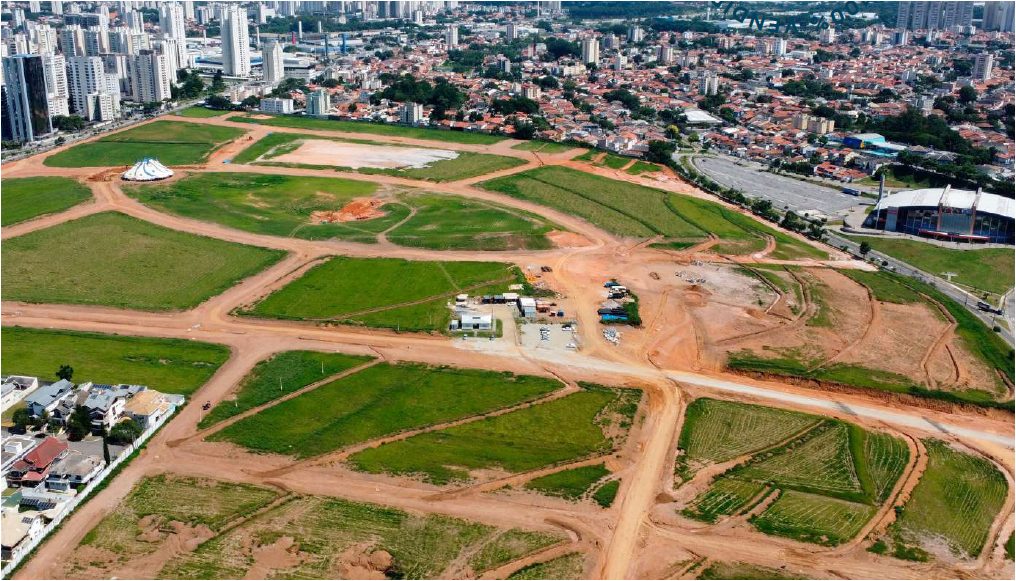Vista aérea da área do Parque Una com o traçado de ruas e avenidas em implantação — imagem ilustrativa
